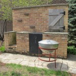 original weber grill next to traditional bbq