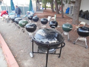 Grilling is serious business. Thanksgiving 2013 - 11 kettles, 2 Ranch kettles, 30 turkeys in 6 hours. Nice job Jim!