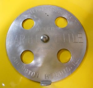 Close up of 18.5 Yellow kettle with BAR-B-Q-KETTLE vent