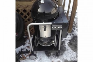 The  WSM has always been jealous of all the traveling the kettle next door does. Always wheeling around to and fro. Its time for the WSM to get mobile!