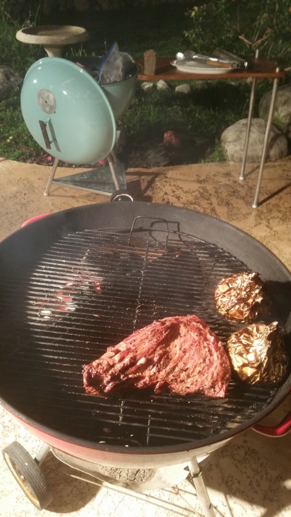 I'll spare the silly drama here. Montreal seasoned tritip and some BITCHIN Beef Boullion Onions. First problem. Full chimney of charcoal and a large chunk of wood sits higher than the cooking grate. The cooking grate still sits securely, but it sits at an angle. Good thing TriTips don't roll!