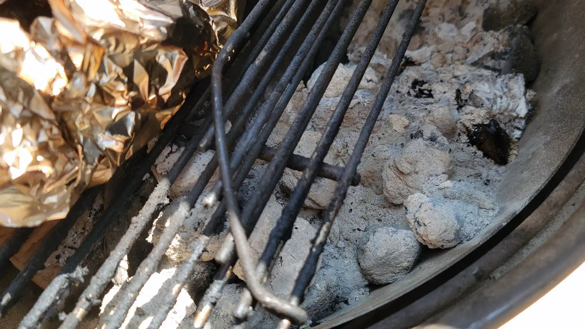 Spent coals and ash leftovers from a low and slow cook with the Royal Oak SUPER SIZE briquettes
